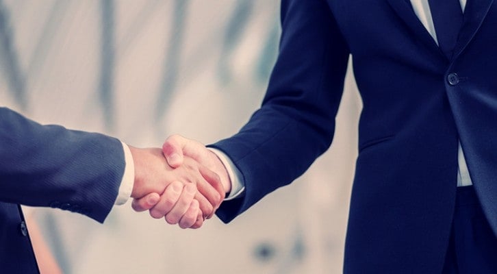 Improve communication in business- Shaking Hands - Feature